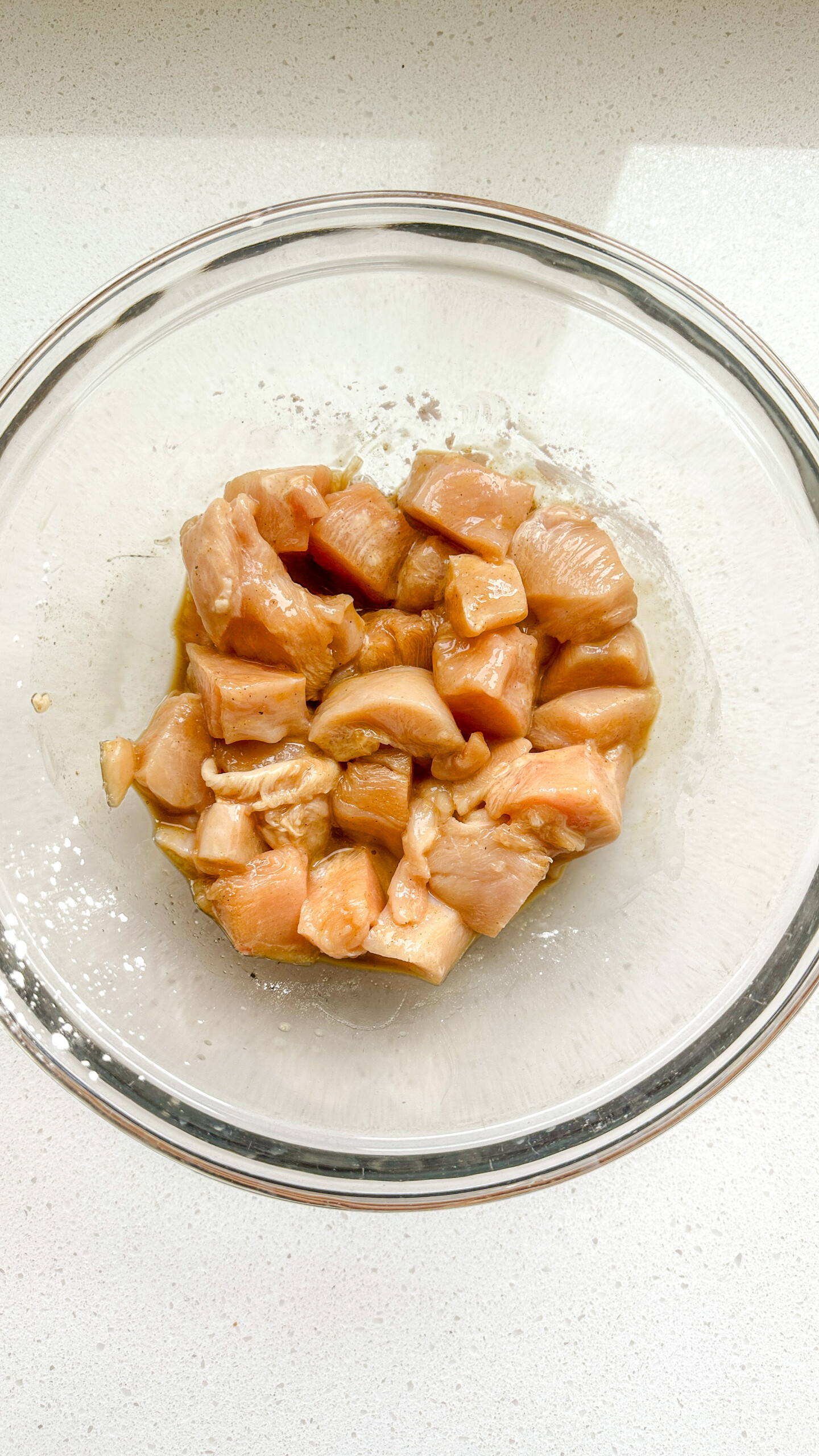 Cubed chicken in a bowl.