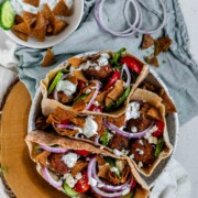 Pita stuffed with meatballs, tomato, cucumber, onion, tzatziki, and crispy pita bits.