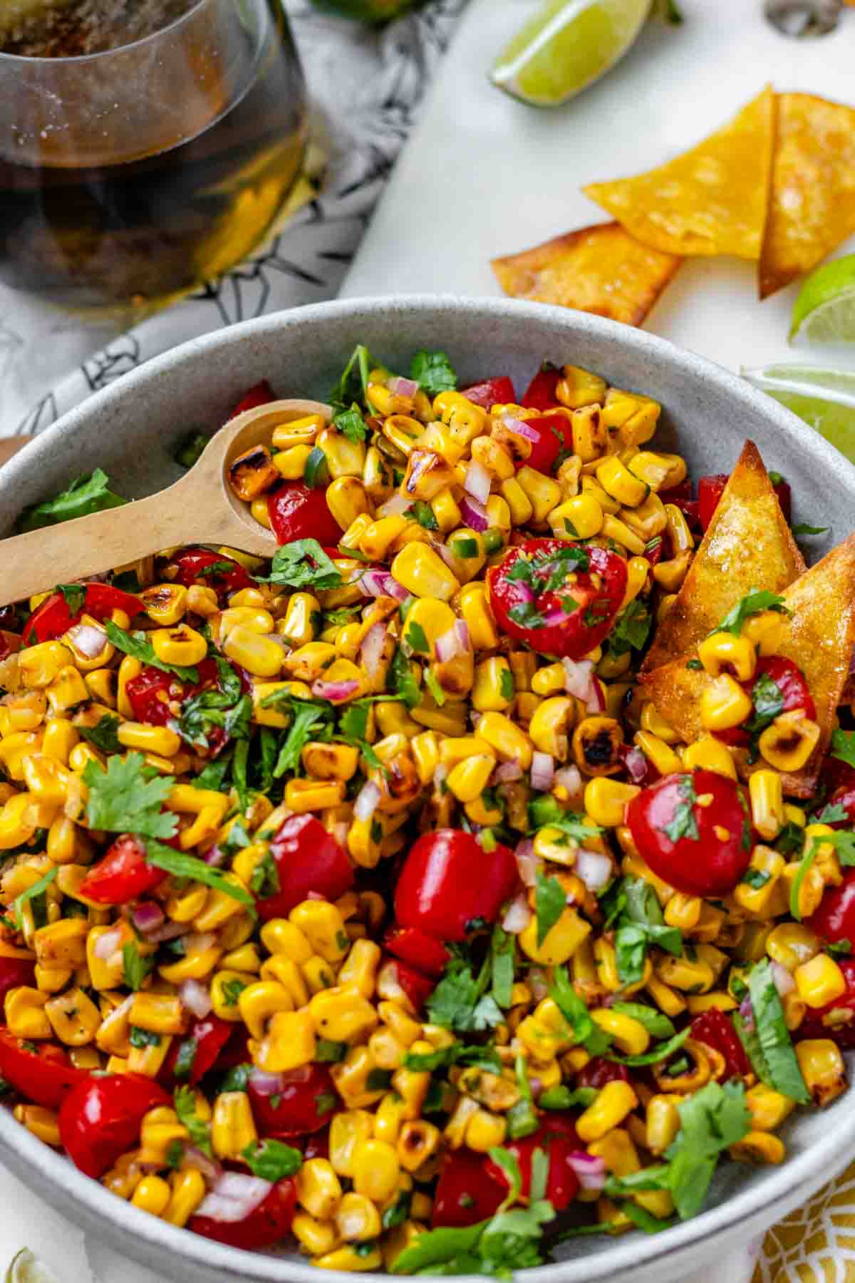 A corn and tomato salsa in a bowl.