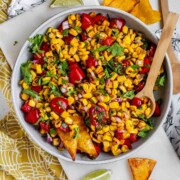 A corn and tomato salsa in a bowl.