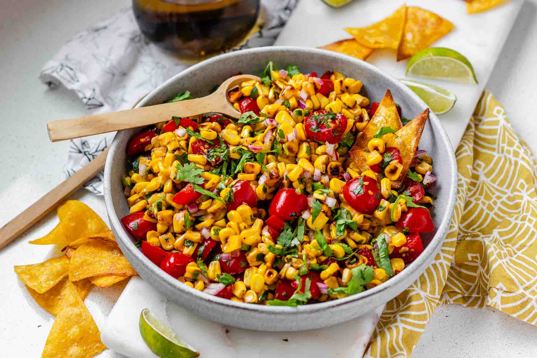 A corn and tomato salsa in a bowl.