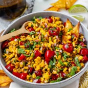 A corn and tomato salsa in a bowl.