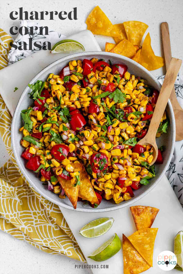 A corn and tomato salsa in a bowl with the text charred corn salsa.