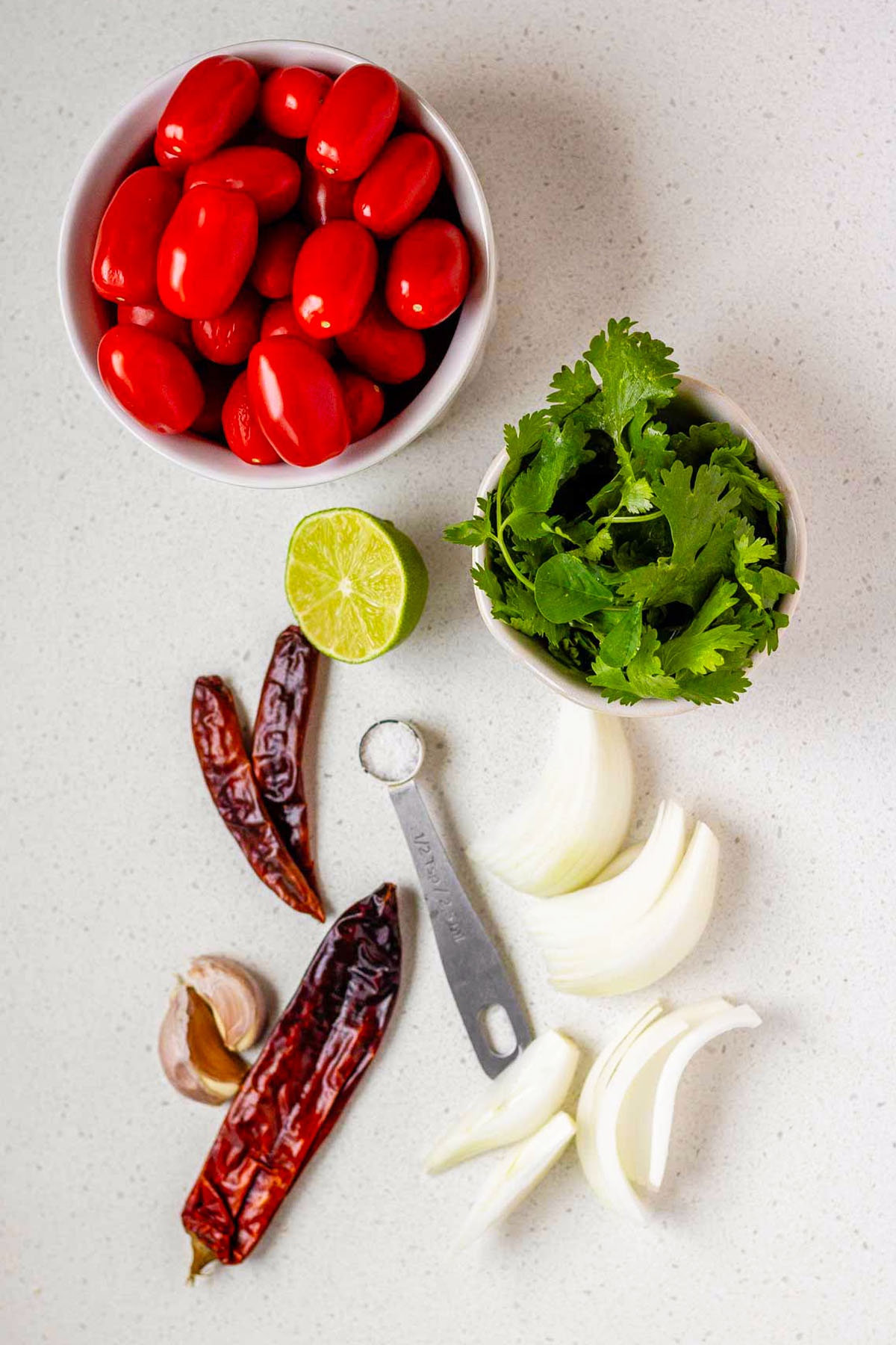 Ingredients in bowls for salsa.