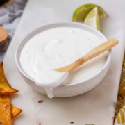 A white sauce in a bowl.