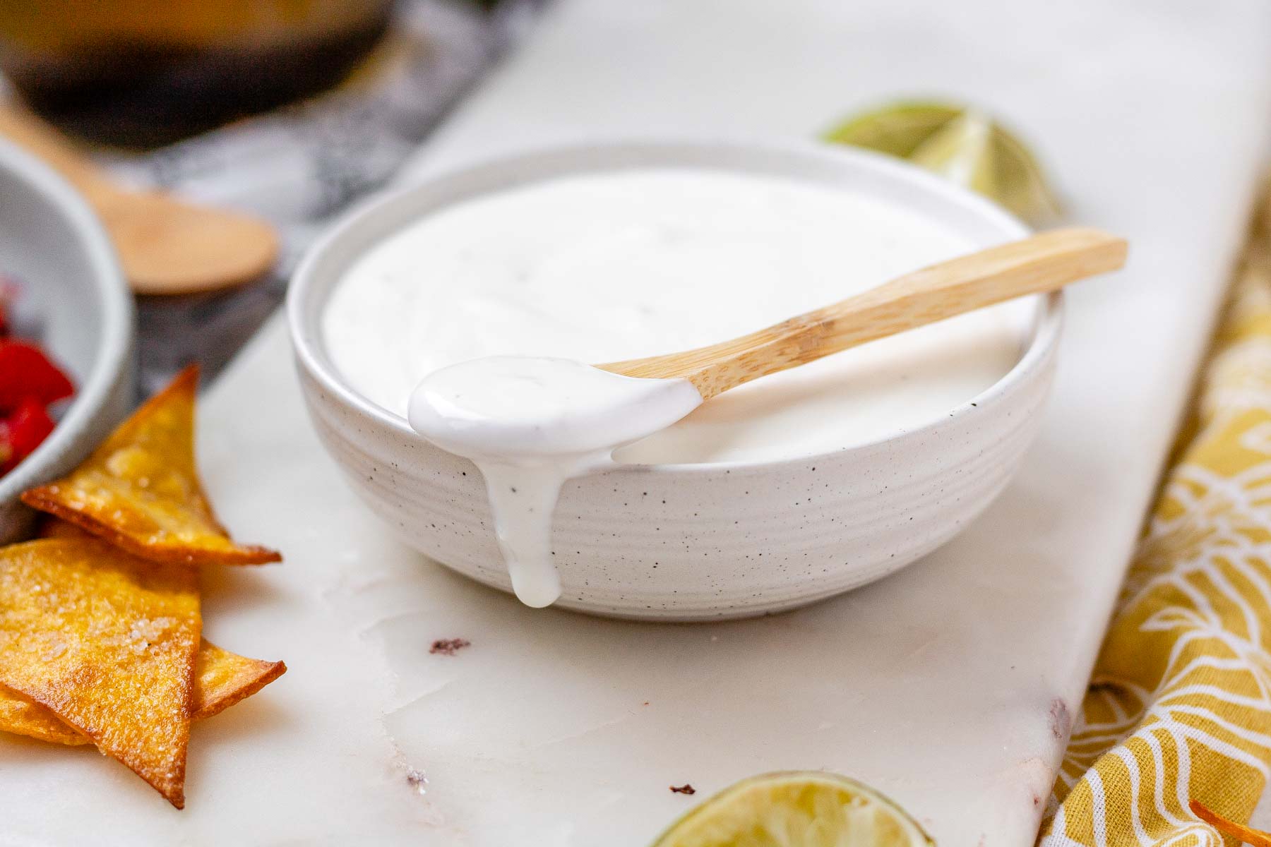 A white sauce in a bowl.