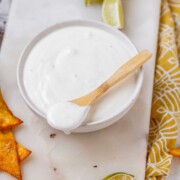 A white sauce in a bowl.
