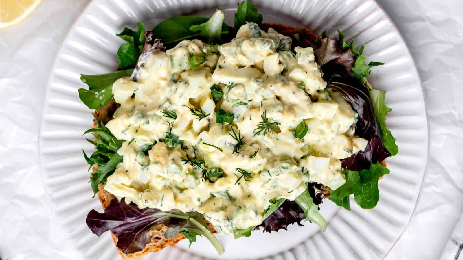 Creamy cottage cheese egg salad served on toast.