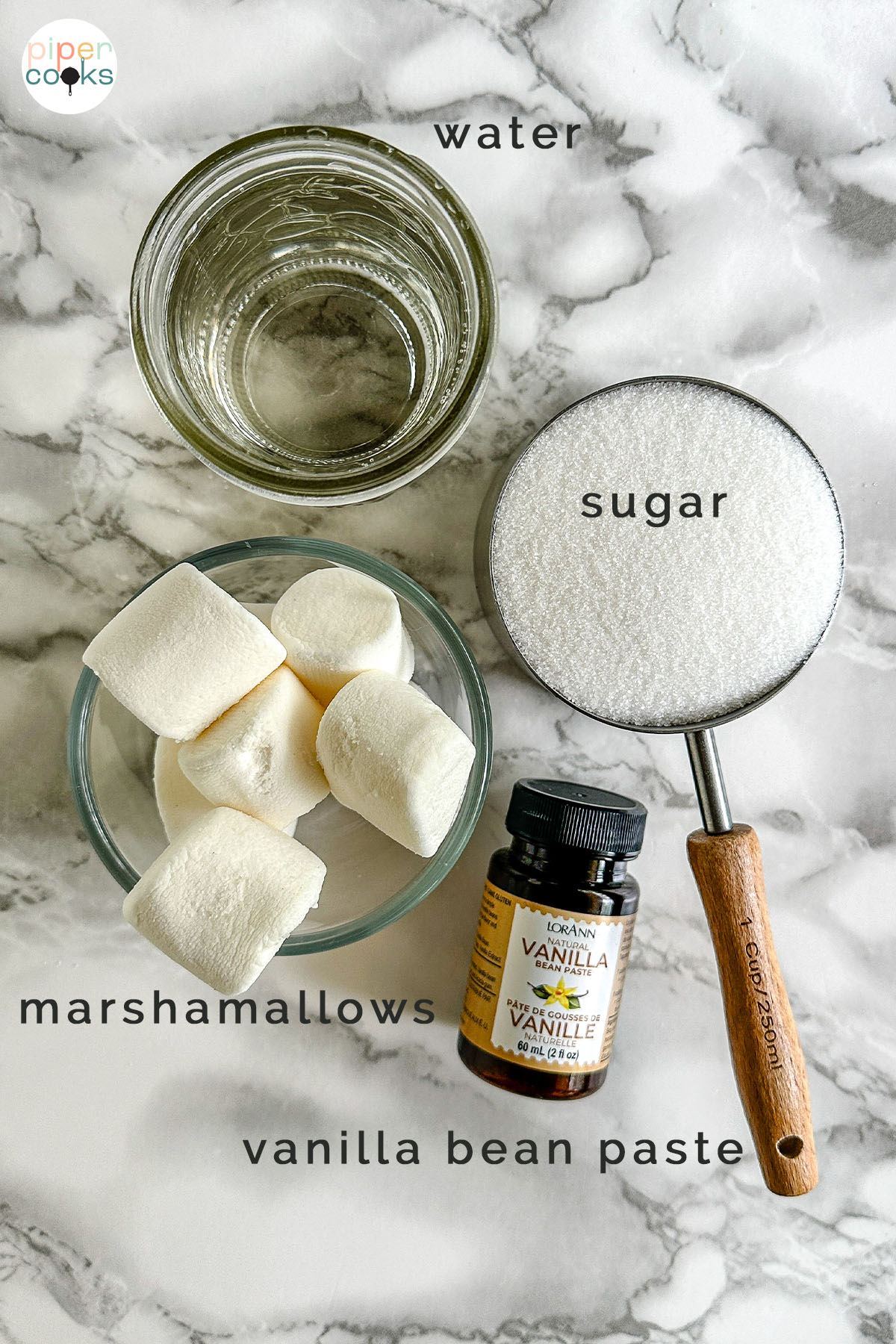 Ingredients for toasted marshmallow syrup including sugar, water, marshmallows, and vanilla