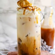 Peanut butter marshmallow iced latte with homemade syrups, topped with toasted marshmallows and peanut butter syrup drizzle.