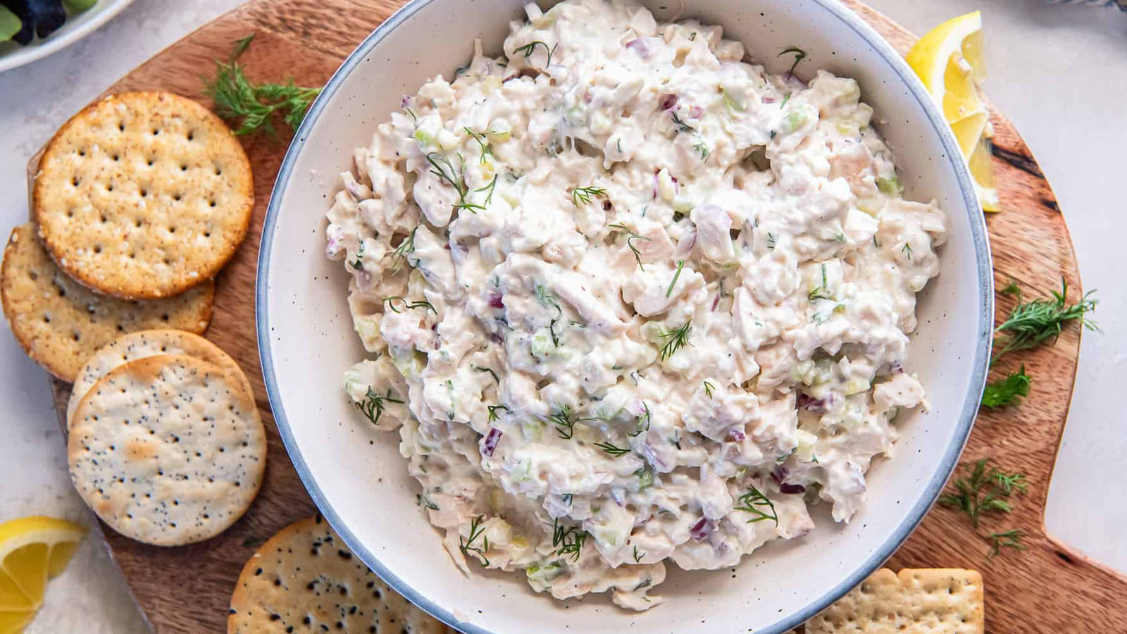 Cottage cheese chicken salad with creamy dressing served in a bowl.