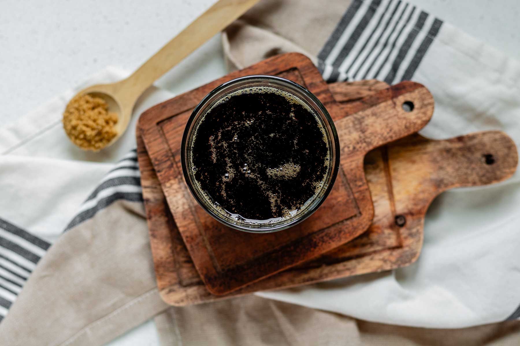 Brown sugar syrup in a glass.