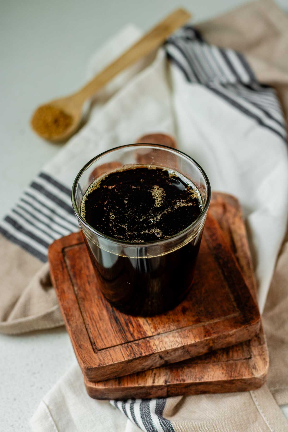 Brown sugar syrup in a glass.