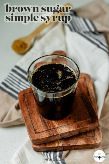 Brown sugar syrup in a glass with the text brown sugar simple syrup.