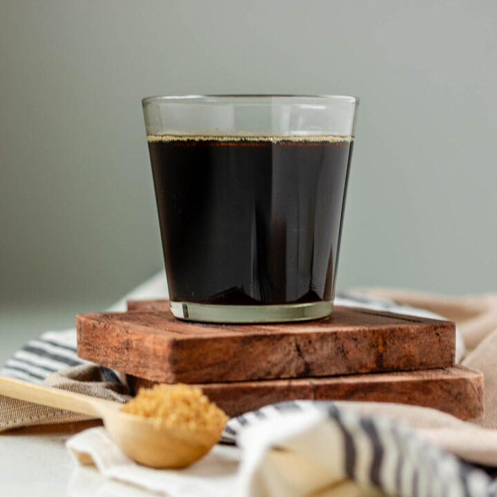 Brown sugar syrup in a glass.