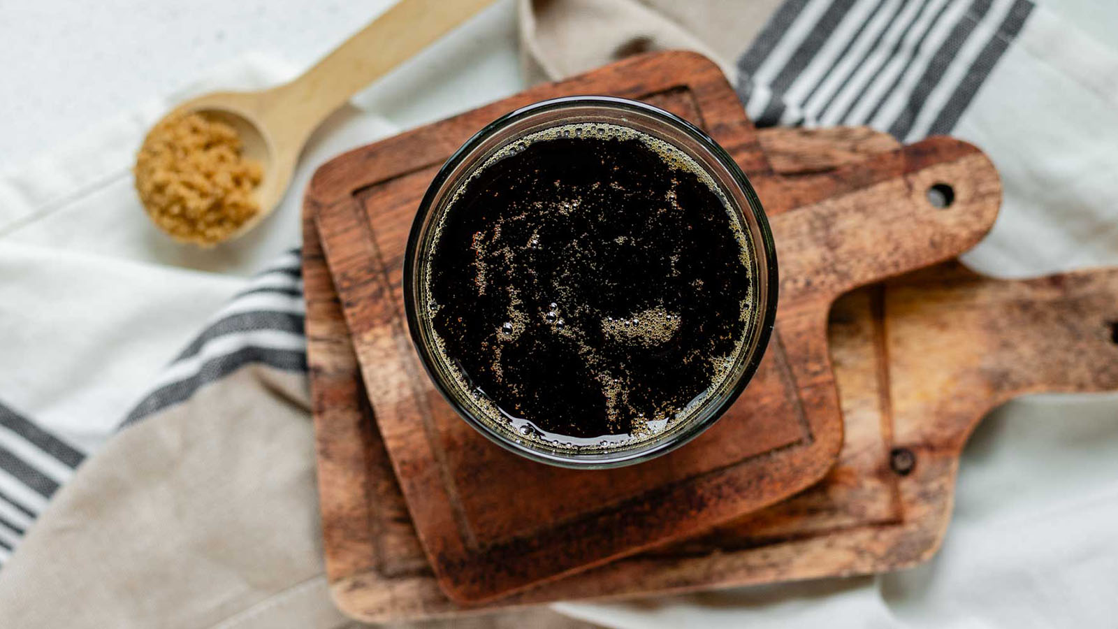 Brown sugar syrup in a glass.