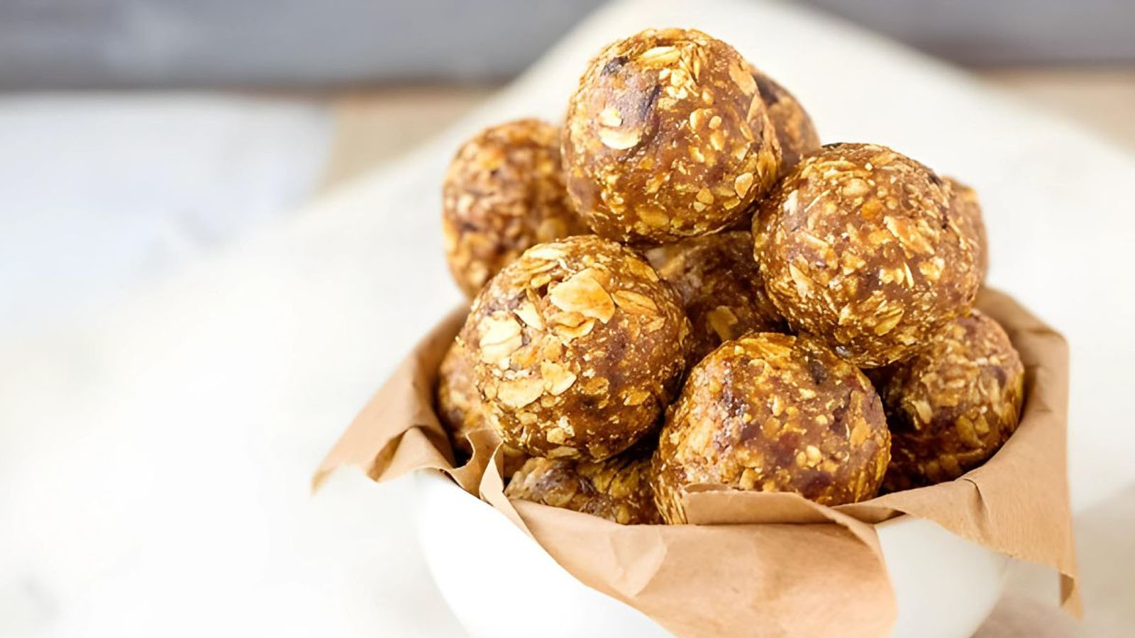 Peanut butter oat balls in a bowl.