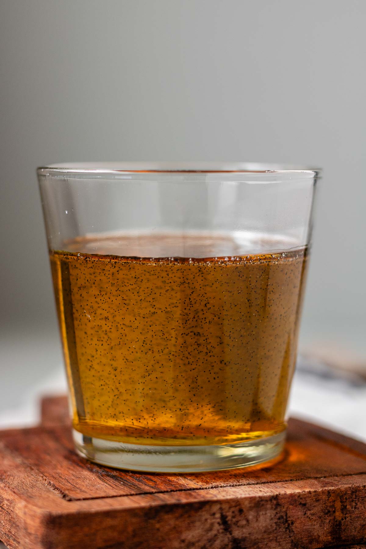 Vanilla bean syrup in a glass.