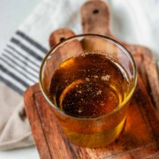 Vanilla bean syrup in a glass.