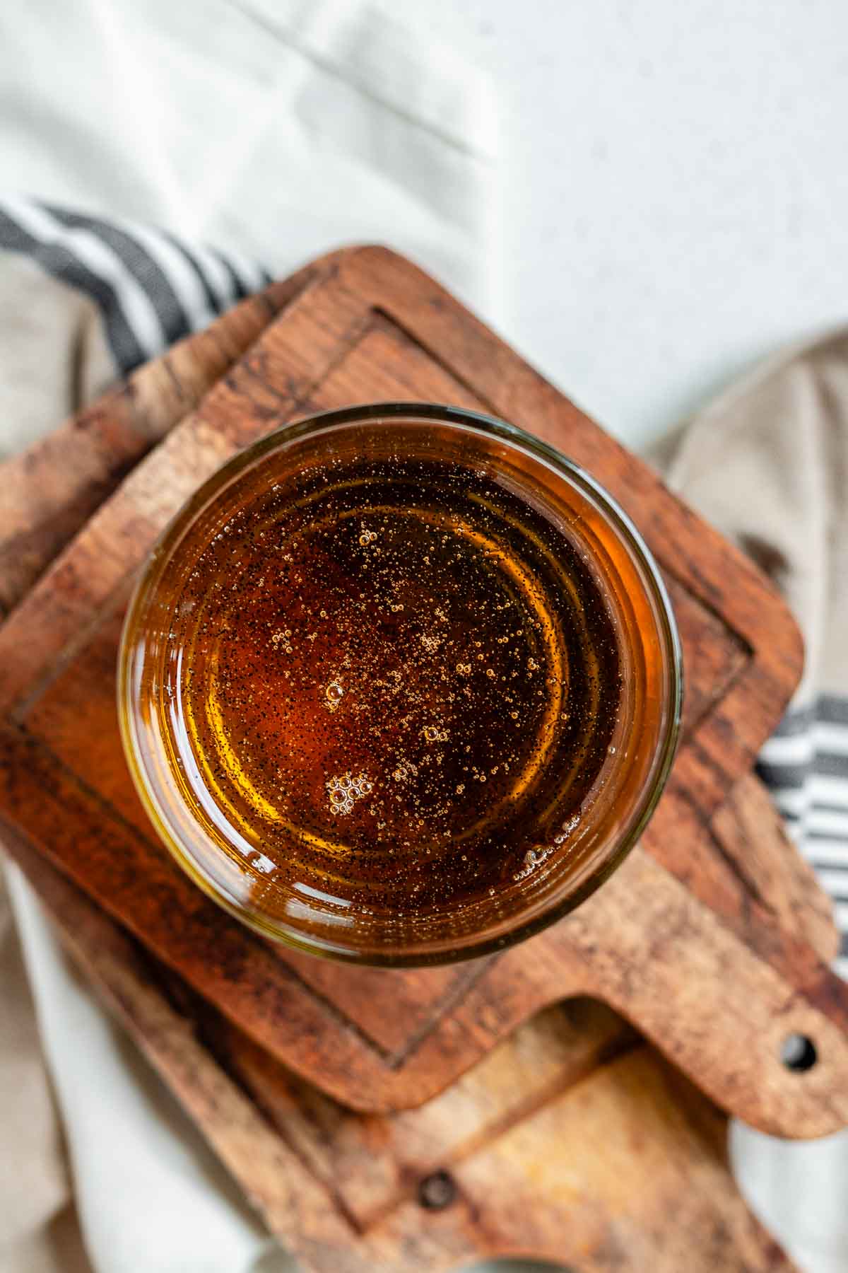 Vanilla bean syrup in a glass.